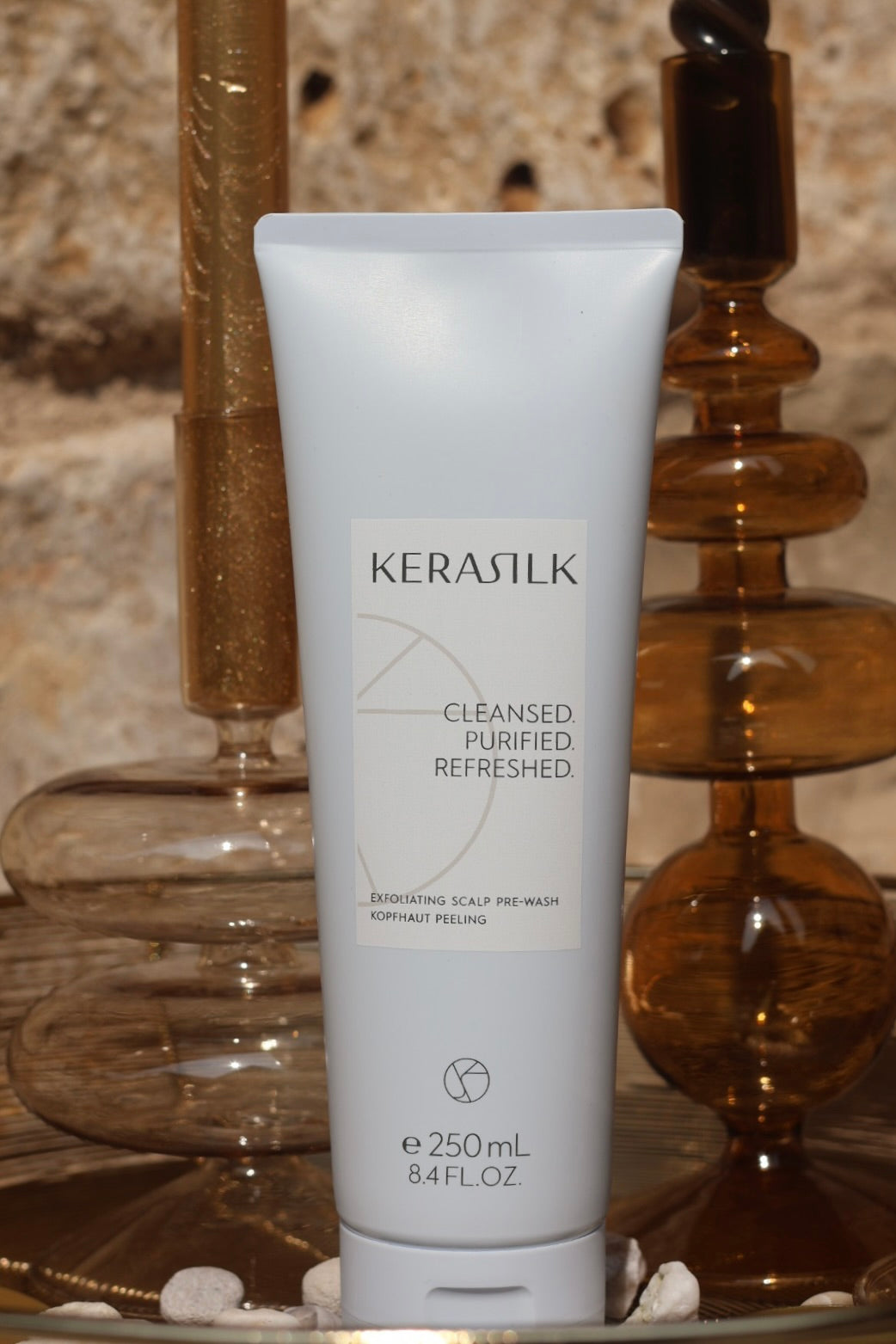 Exfoliating scalp pre-wash